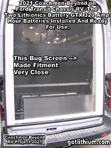 2021 Coachmen Beyond on a Ford Transit Chassis RV Lithionics Battery lithium-ion battery installation project photo - completed battery system is installed and only had a fraction of an inch clearance to the specail rear drop-down bug screen.